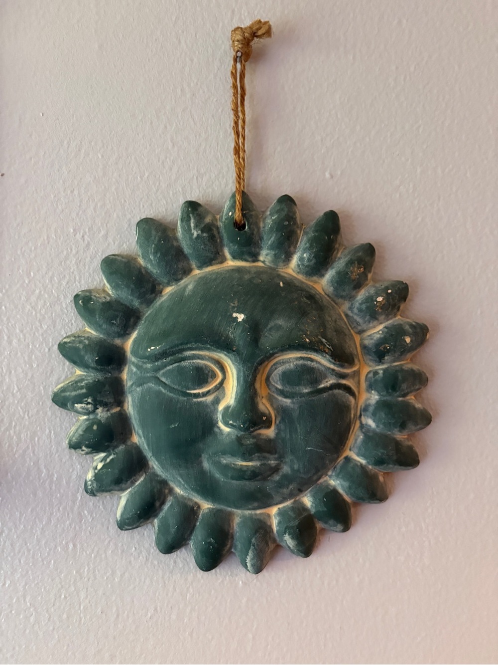 Handcrafted ceramic sun face wall hanging